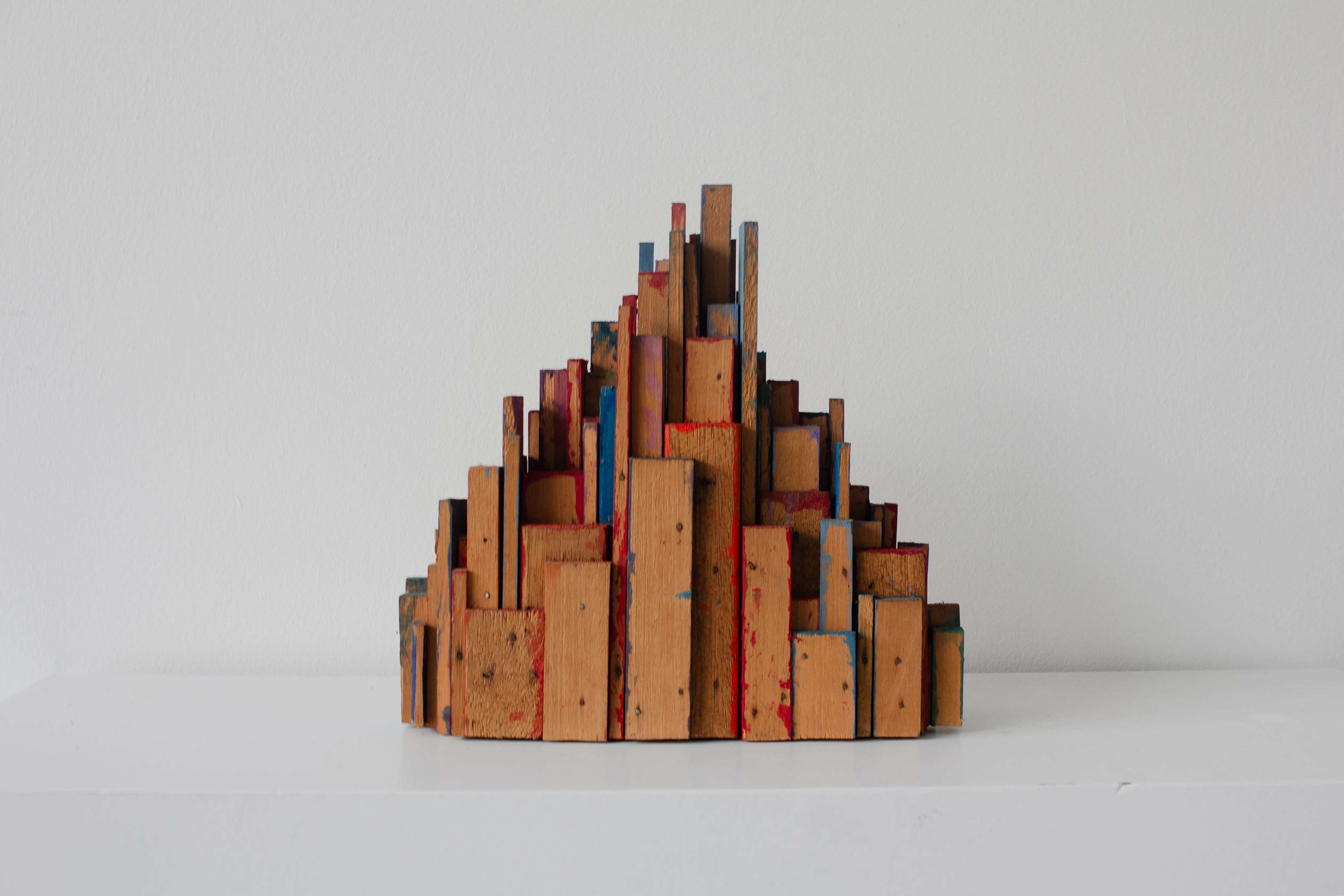 Barewood Tower, a painted wood sculpture by Oleg Prokofiev
