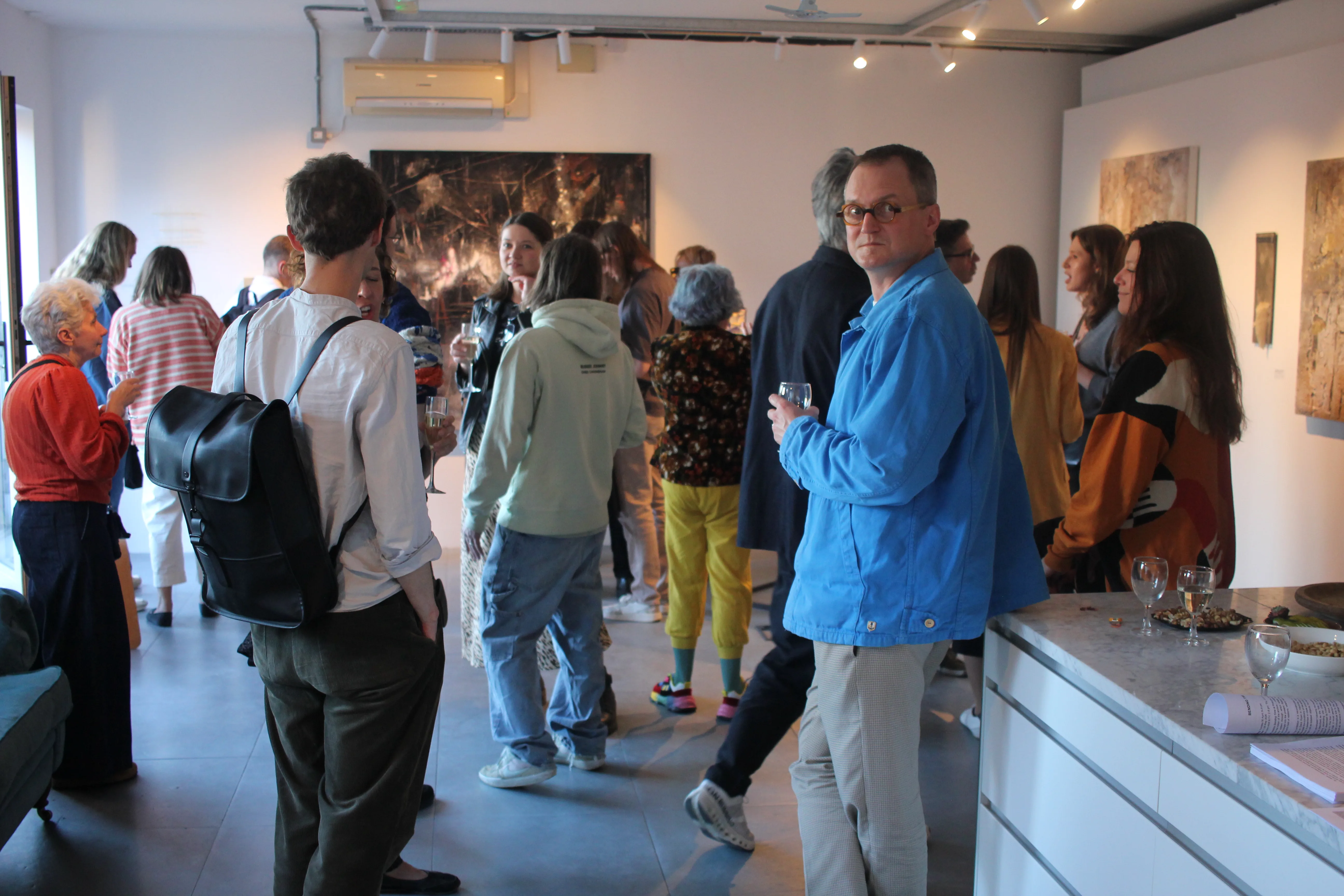 Visitors inside the Bending Time exhibition