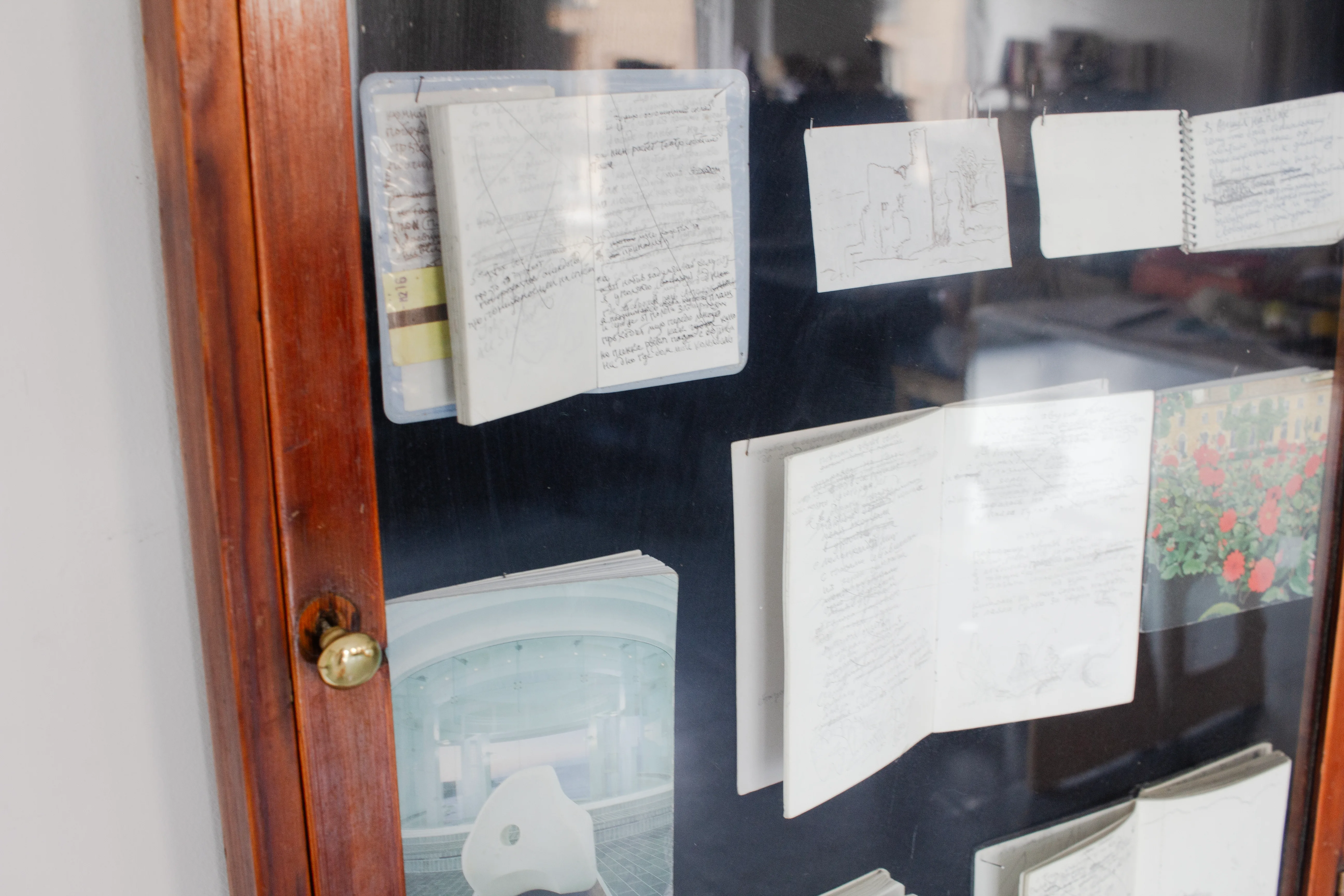 Oleg Prokofiev’s sketchbooks and notebooks displayed in an archival cabinet