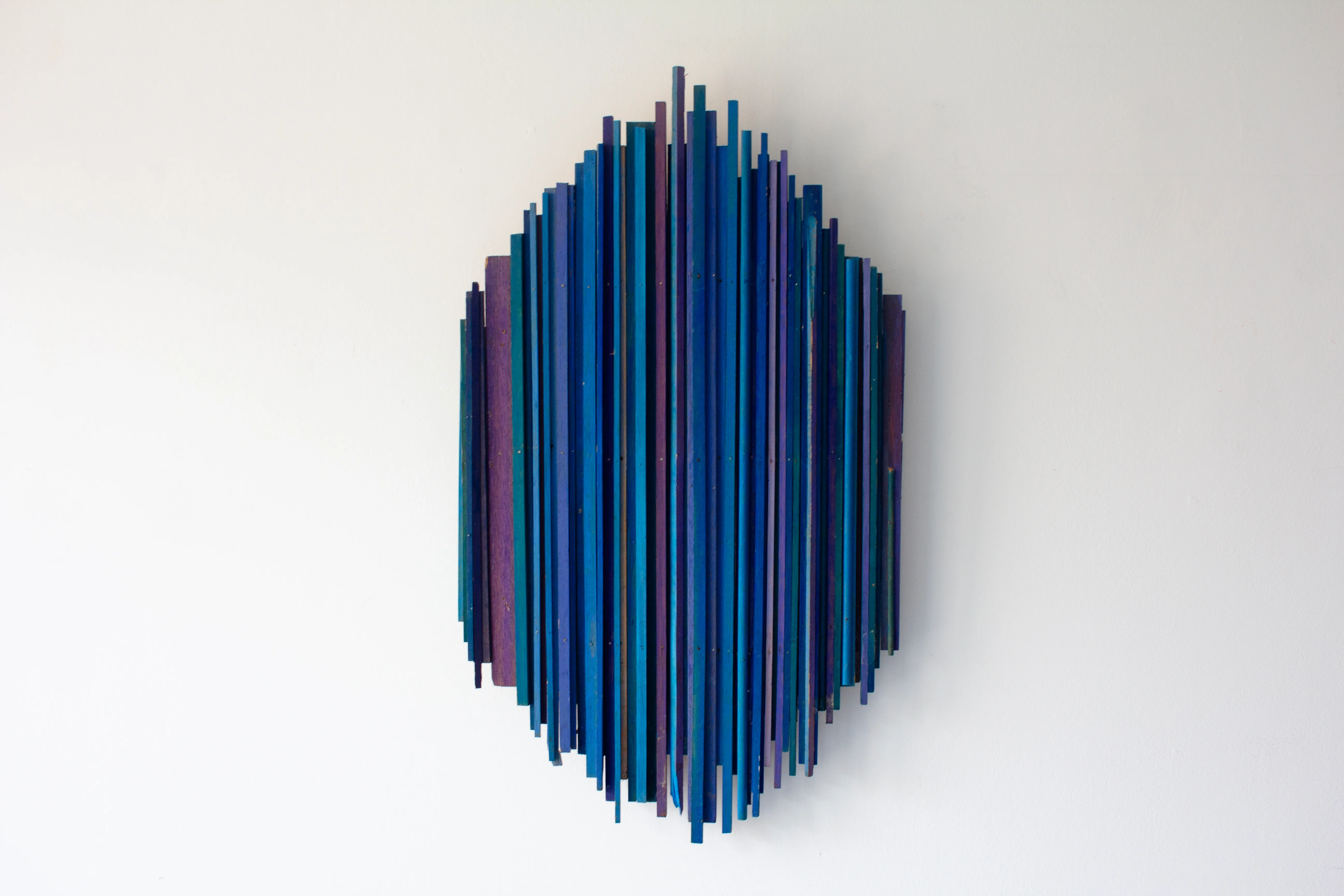 Oval Manhattan Bluemauve, a painted wood sculpture by Oleg Prokofiev